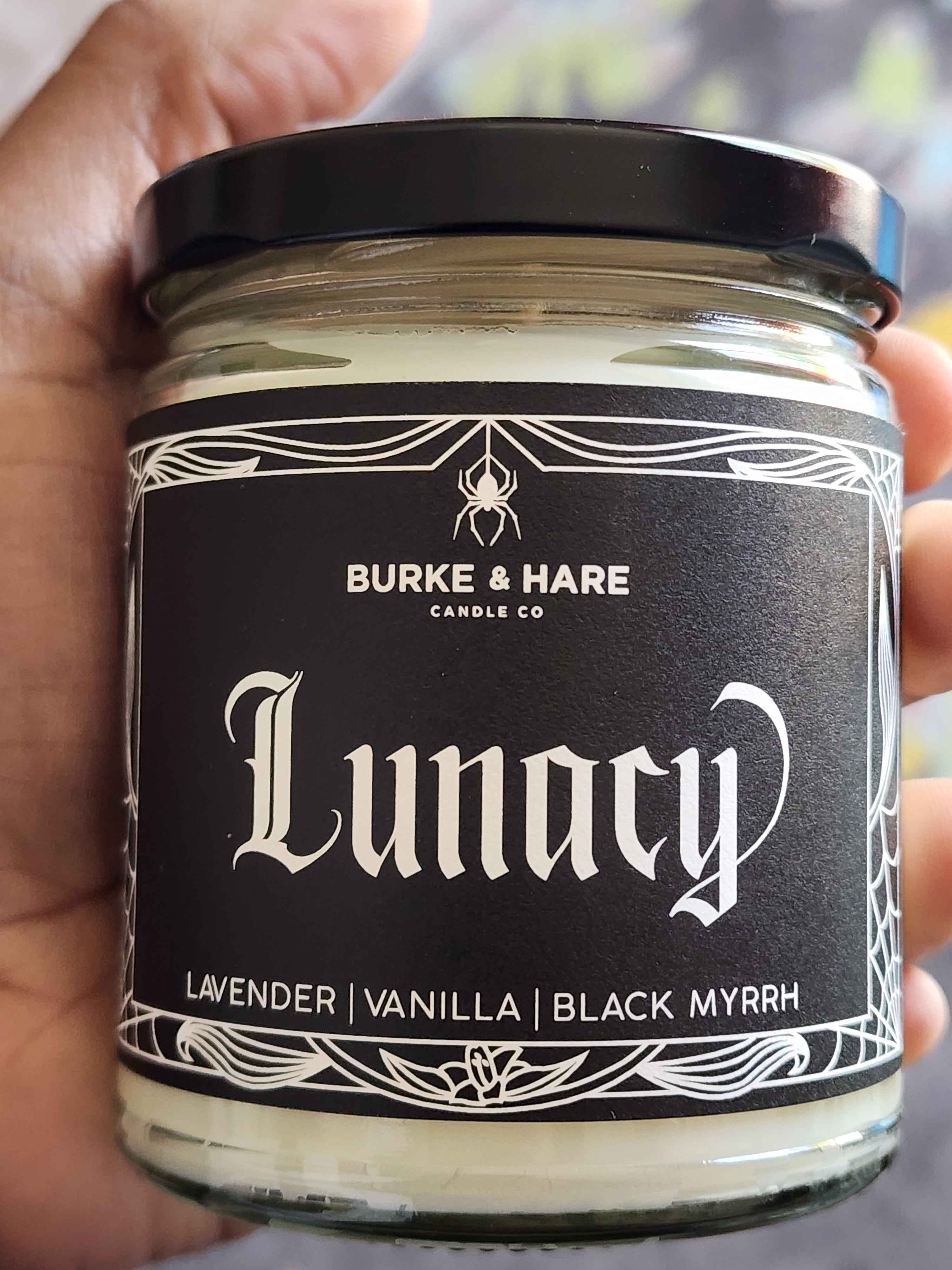 ID: a candle from Burke & Hare co called Lunacy, described as a blend of Lavender, Vanilla, and Black Myrrh