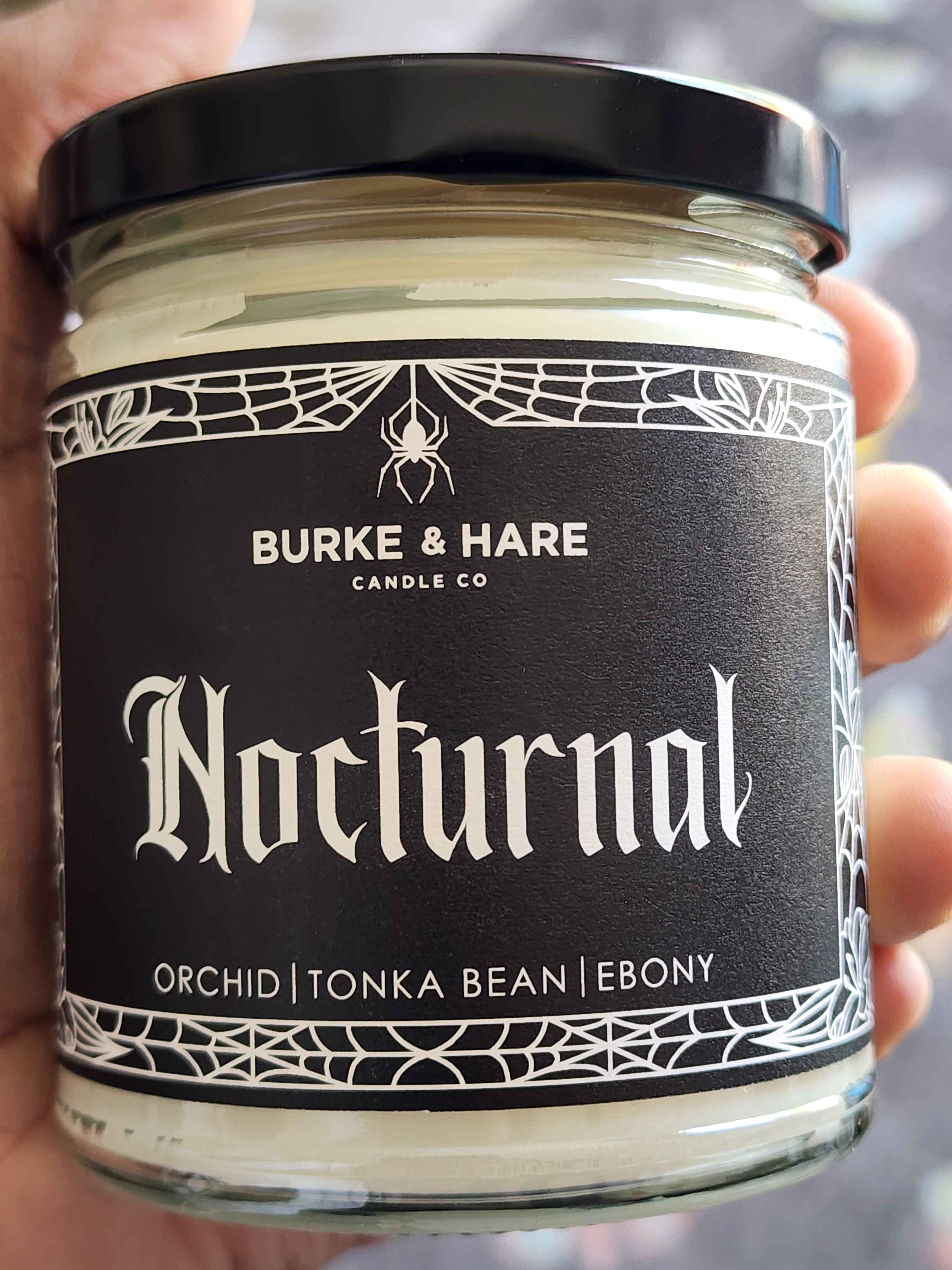 ID: a candle from Burke & Hare Co called Nocturnal, described as a blend of orchid, tonka bean, and ebony 